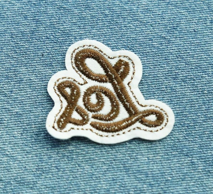 Irregular badge sew on embroidery patches